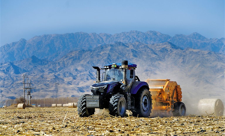 残膜回收助春耕